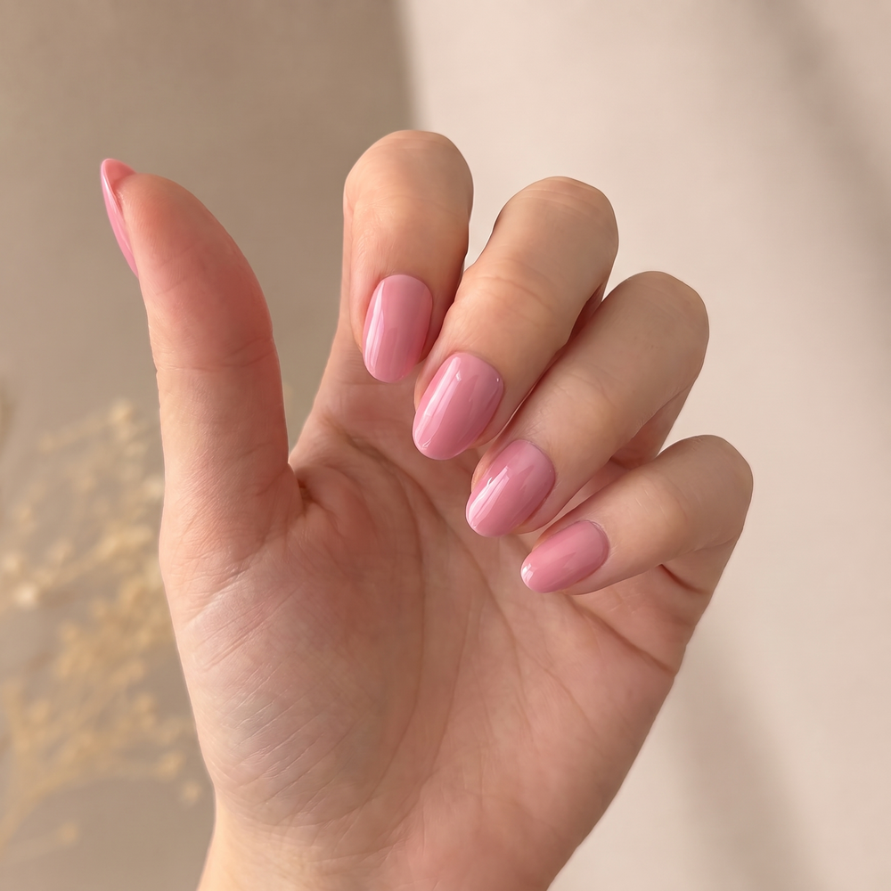 Strawberry Glaze press-on nails — worn lifestyle hero