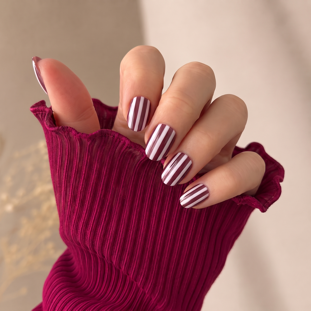 Sugar Stripes press-on nails — worn lifestyle hero