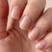 Bare Minimum press-on nails — glossy fingertip close-up
