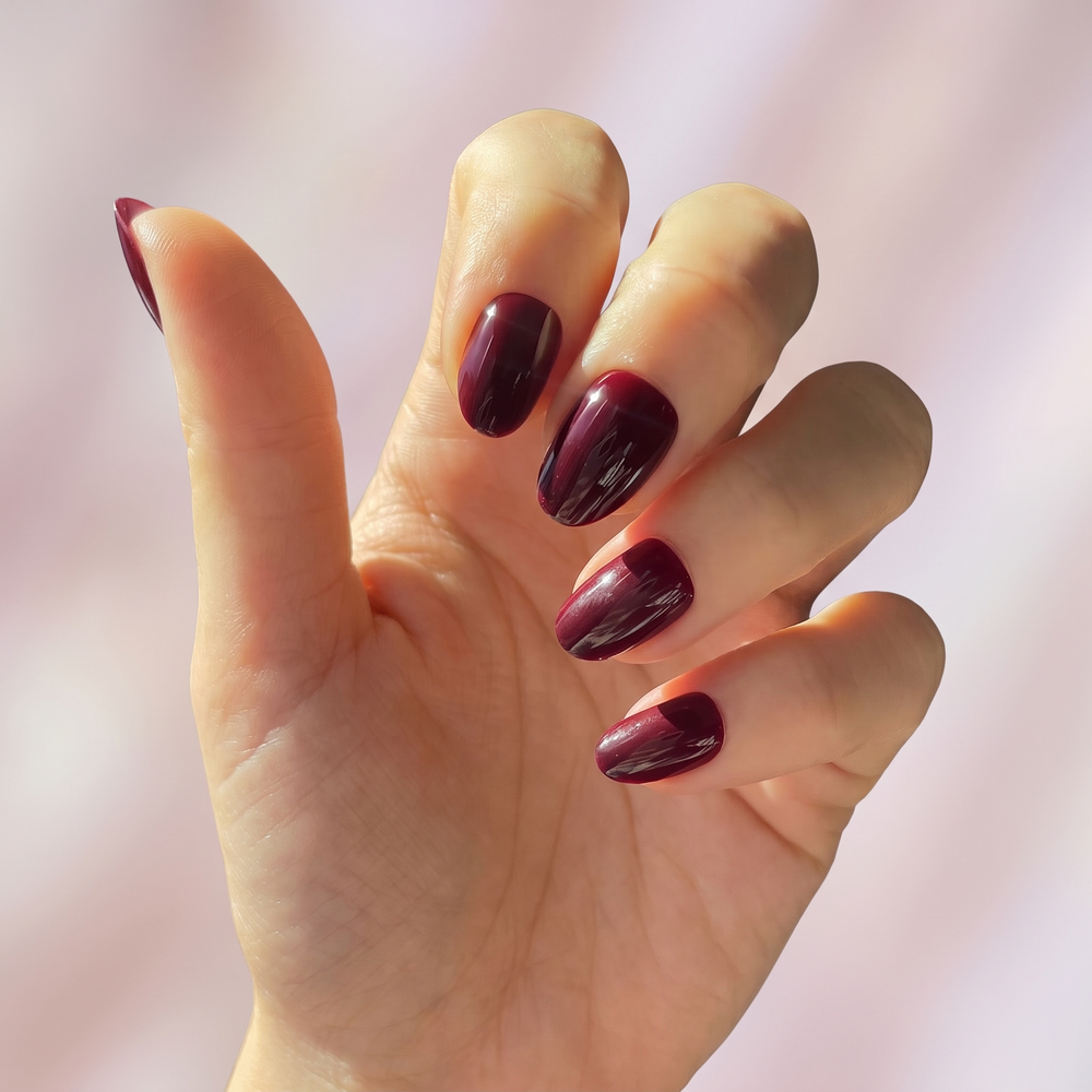 Sour Grape press-on nails — worn lifestyle hero