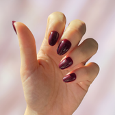 Sour Grape press-on nails — worn lifestyle hero