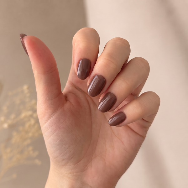 Cocoa Kisses press-on nails — worn lifestyle hero