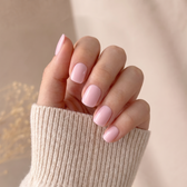 Posy press-on nails — styled hand angle
