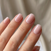 Bella press-on nails — glossy fingertip close-up