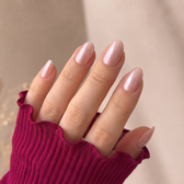 Bella press-on nails — styled hand angle