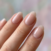 Bare Minimum press-on nails — glossy fingertip close-up