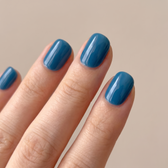 Malibu press-on nails — glossy fingertip close-up