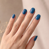 Malibu press-on nails — styled hand angle