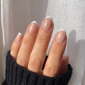 Madeleine press-on nails — glossy fingertip close-up