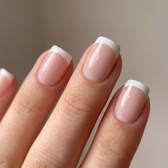 Madam press-on nails — glossy fingertip close-up