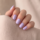 Lavender Haze press-on nails — styled hand angle