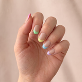 Sunny press-on nails — styled hand angle