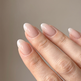 Bare Minimum press-on nails — glossy fingertip close-up
