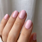 Fondant press-on nails — glossy fingertip close-up