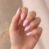 Posy press-on nails — styled hand angle