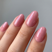 Strawberry Glaze press-on nails — glossy fingertip close-up