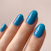 Malibu press-on nails — glossy fingertip close-up
