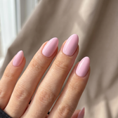 Posy press-on nails — glossy fingertip close-up