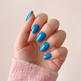 Malibu press-on nails — styled hand angle