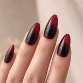 Midnight Vamp press-on nails — glossy fingertip close-up