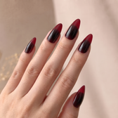 Midnight Vamp press-on nails — styled hand angle